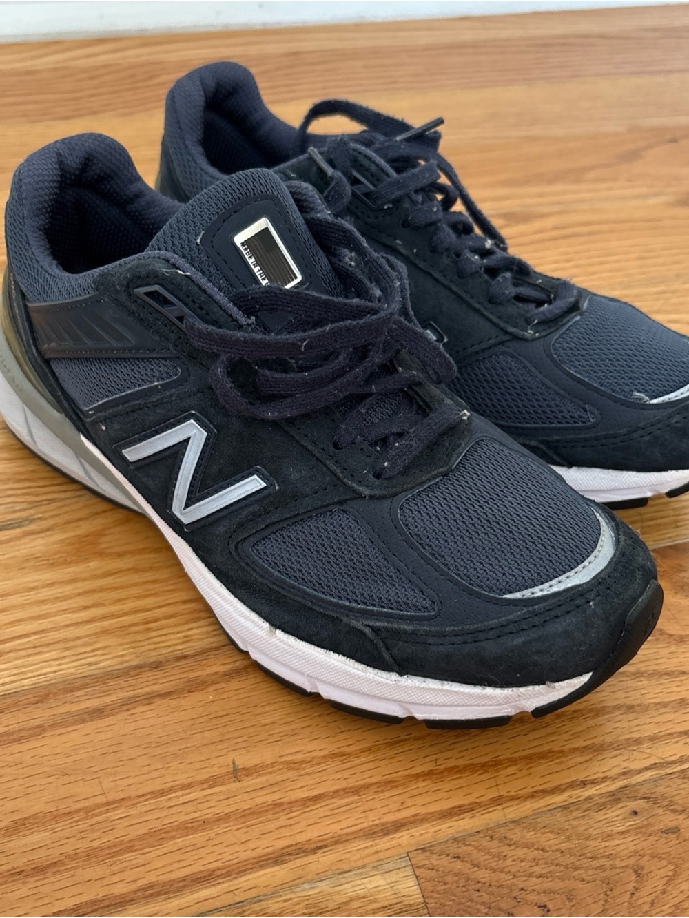 New Balance Men's Dark Blue Athletic Sneakers with White Accents